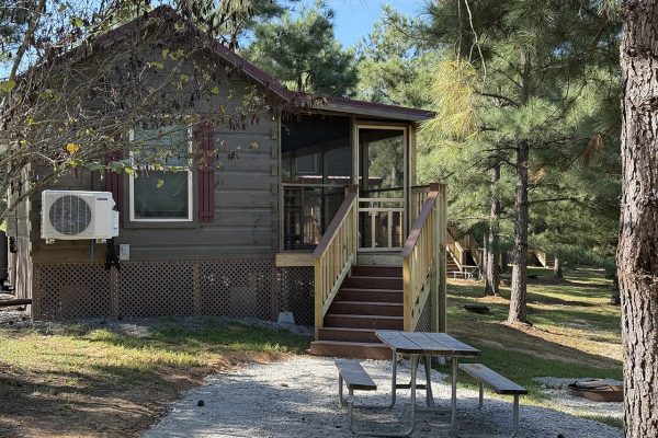 Exterior with porch of Firedance Overlook at Yogi Bear's Jellystone Park™ in Asheboro NC Exterior with porch of Firedance Overlook at Yogi Bear's Jellystone Park™ in Asheboro NC