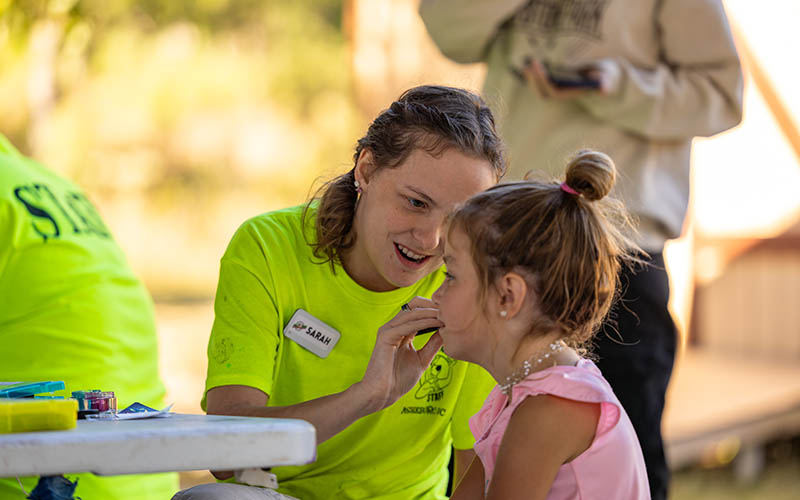 Child enjoying arts and crafts at Asheboro Jellystone Park