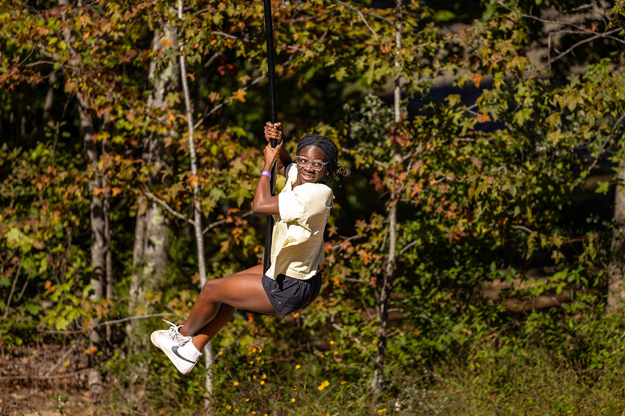 Guest enjoying an outdoor fall adventure at Asheboro Jellystone Park